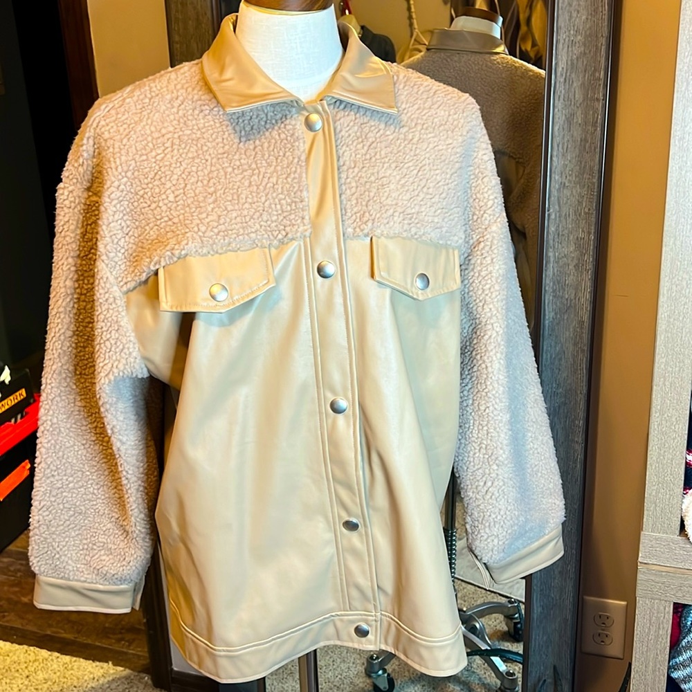 Sherpa and Vegan Leather Jacket. Oversized Medium. Would fit up to an xl. Cute!
